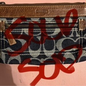 Sold

Coach Denim Monogram Wristlet